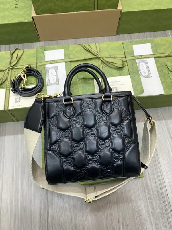 First bag ru GUCCI GG matelassé mini top handle bag