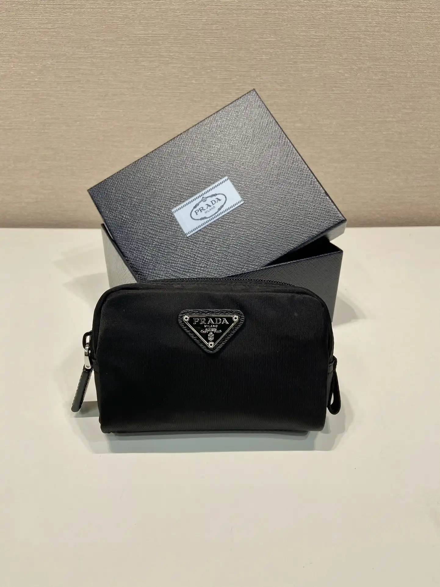 First bag ru PRADA Re-Nylon necessaire