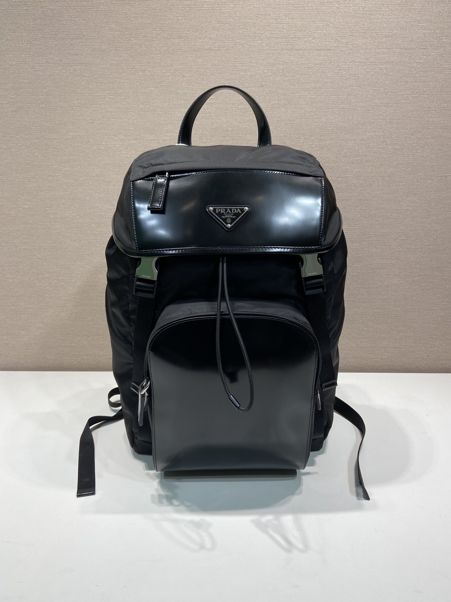 HOT SALE PRADA Re-Nylon and brushed leather backpack