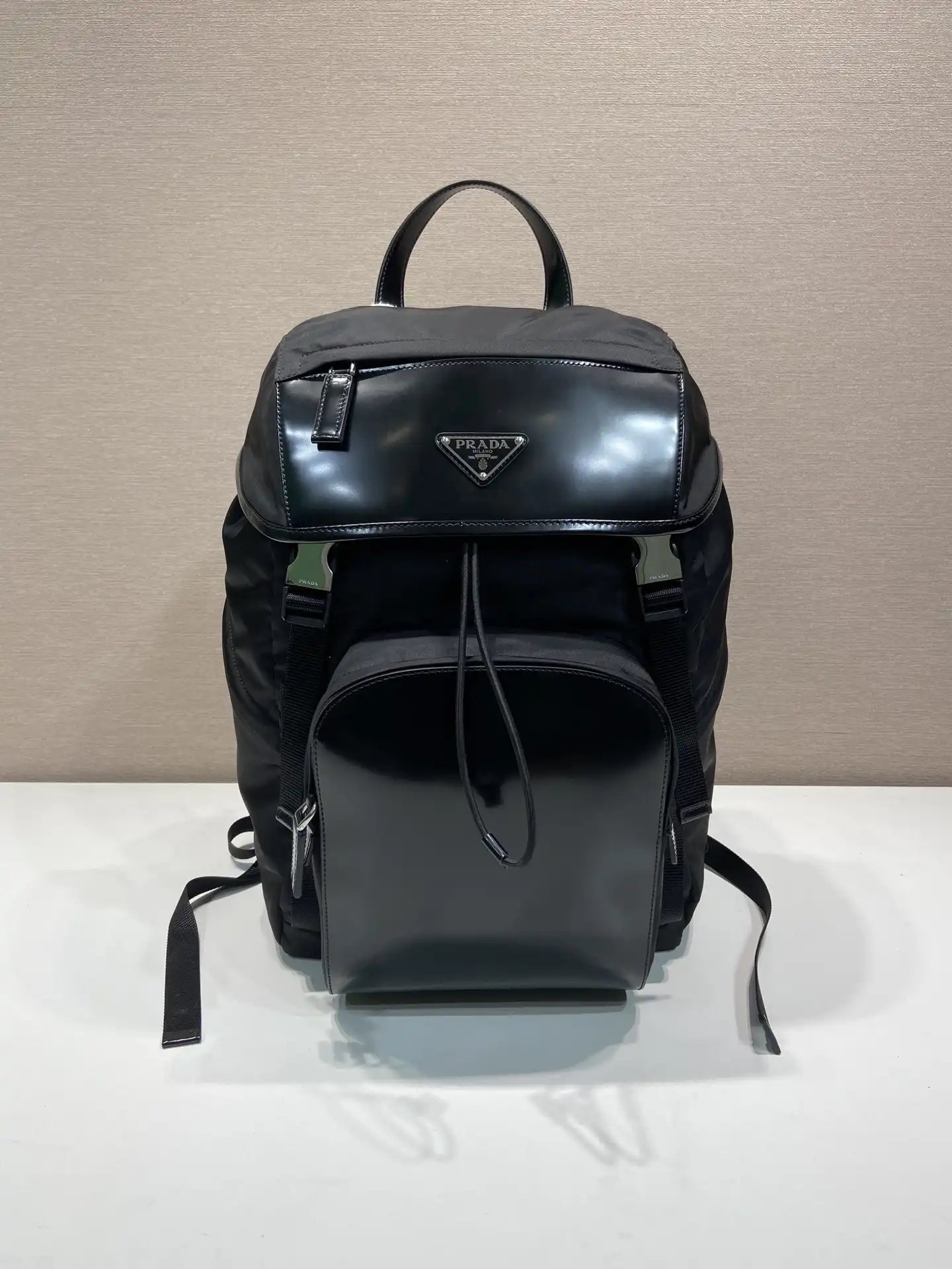 Frstbag ru PRADA Re-Nylon and brushed leather backpack