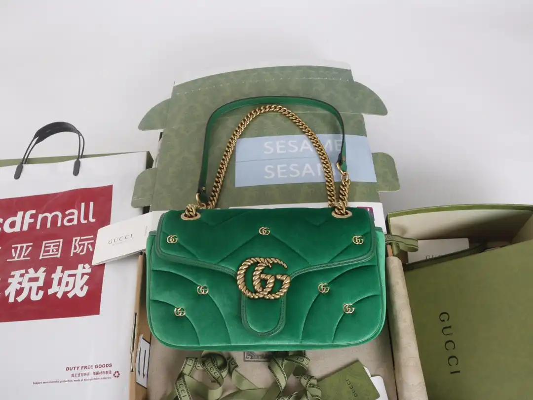 First Bag Ru GUCCI GG Marmont mini shoulder bag