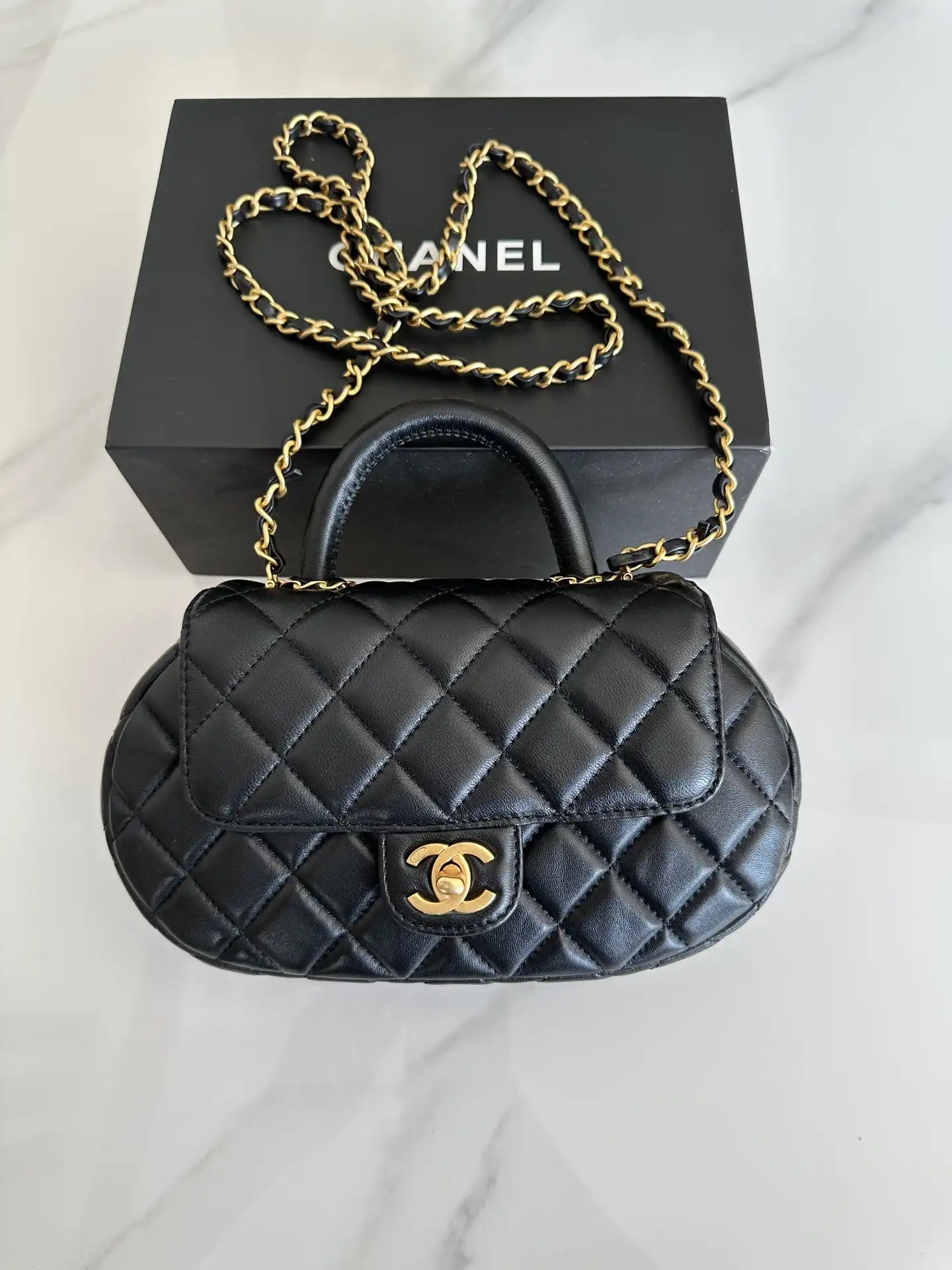 CHANEL FLAP BAG WITH TOP HANDLE