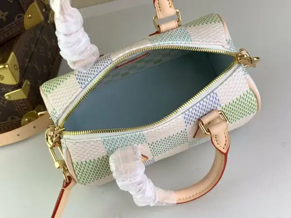 First bag ru LOUIS VUITTON SPEEDY BANDOULIÈRE 20