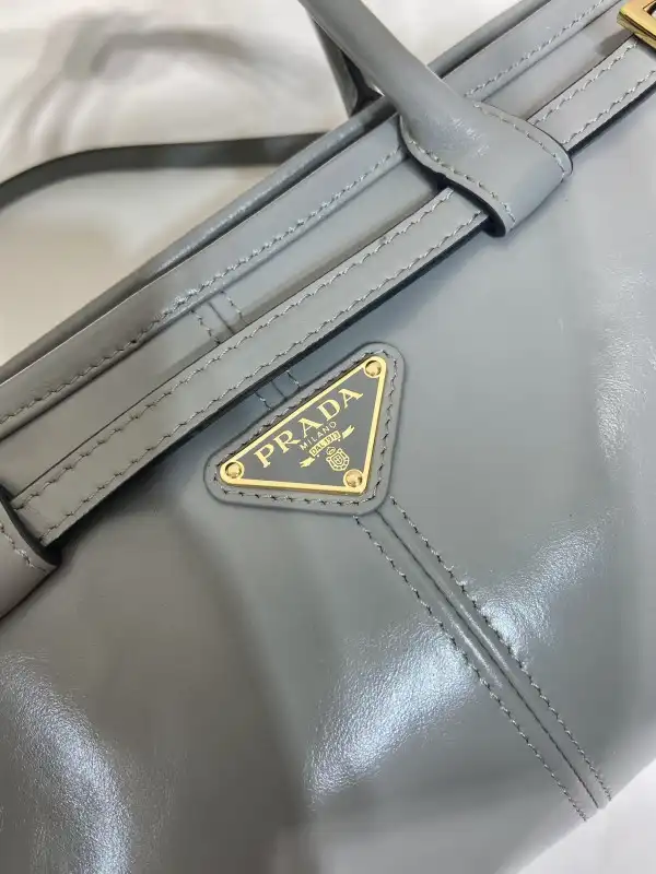 First bag ru Prada Medium leather handbag