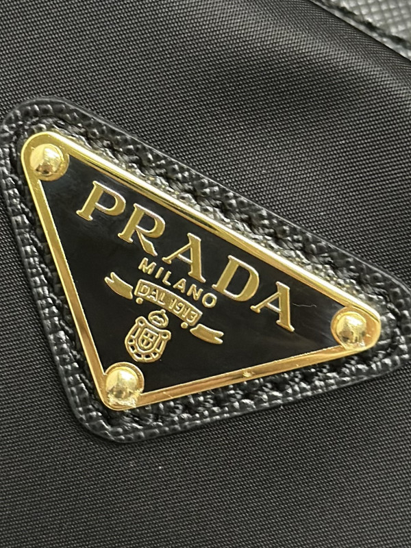 HOT SALE Prada Re-Nylon and Saffiano leather top-handle bag