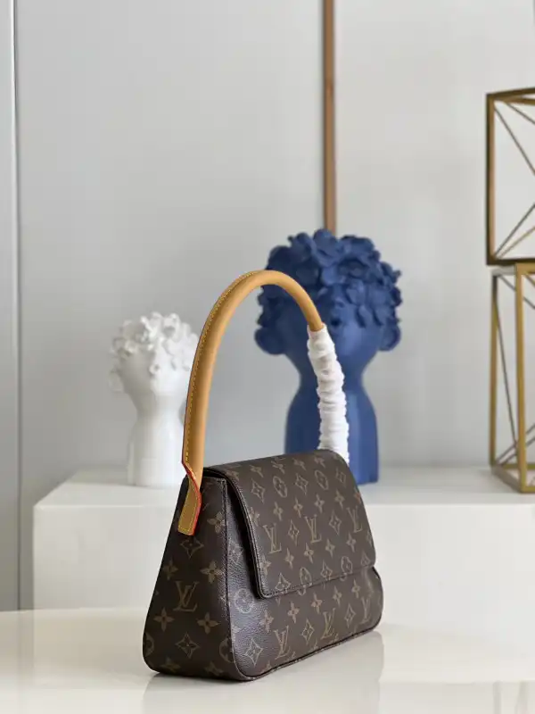 Repladies offers premium fake Louis bags at unbeatable prices. Our products are cheap because we focus on direct sales Louis Vuitton looping bag-24x21x9cm