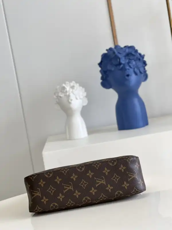 Repladies offers premium fake Louis bags at unbeatable prices. Our products are cheap because we focus on direct sales Louis Vuitton looping bag-24x21x9cm