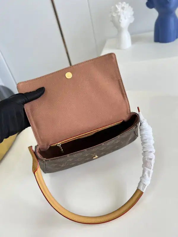 Repladies offers premium fake Louis bags at unbeatable prices. Our products are cheap because we focus on direct sales Louis Vuitton looping bag-24x21x9cm