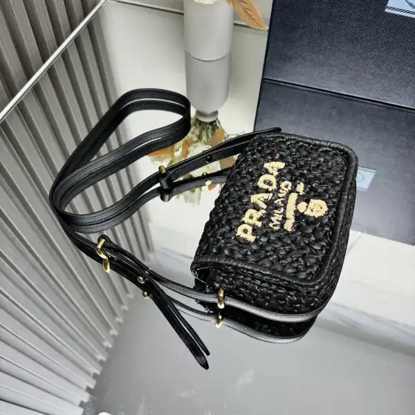 First bag ru Prada Crochet and leather shoulder bag