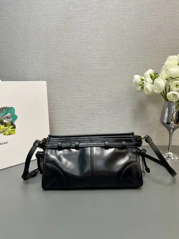 First bag ru Prada Small leather shoulder bag