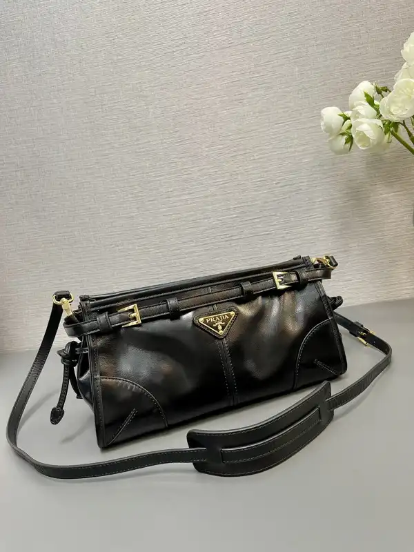 First bag ru Prada Small leather shoulder bag