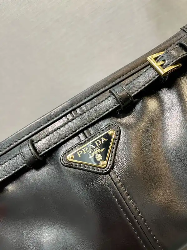 First bag ru Prada Small leather shoulder bag