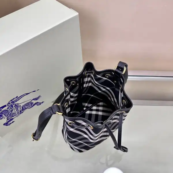 First bag ru Burberry Mini Check Drawstring Pouch​