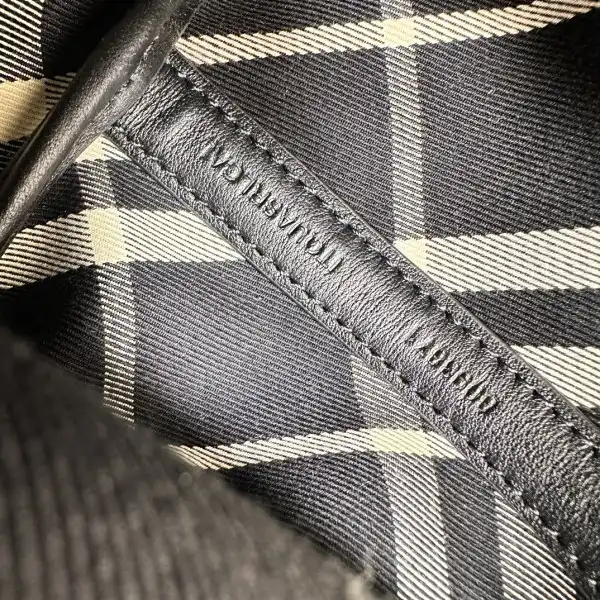 First bag ru Burberry Mini Check Drawstring Pouch​