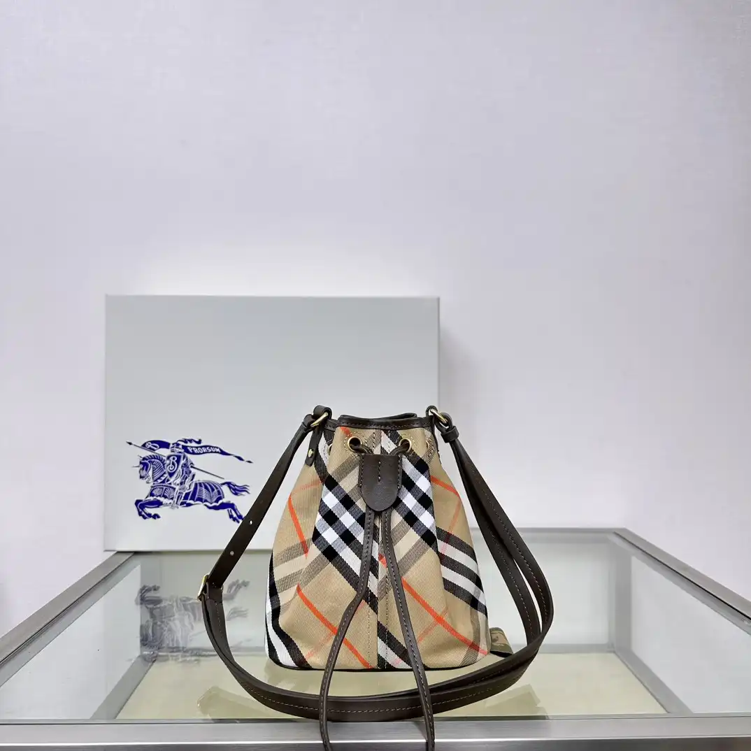 First bag ru Burberry Mini Check Drawstring Pouch​