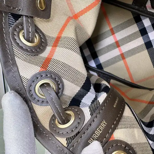 First bag ru Burberry Mini Check Drawstring Pouch​