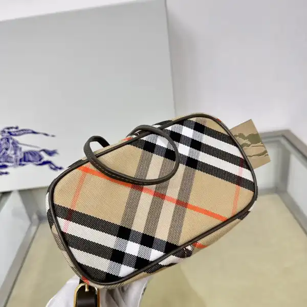 First bag ru Burberry Mini Check Drawstring Pouch​