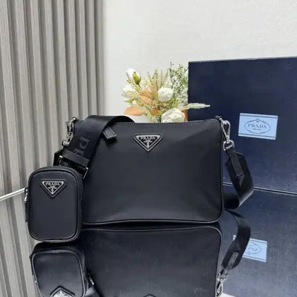 First bag ru Prada Re-Nylon and Saffiano leather shoulder bag