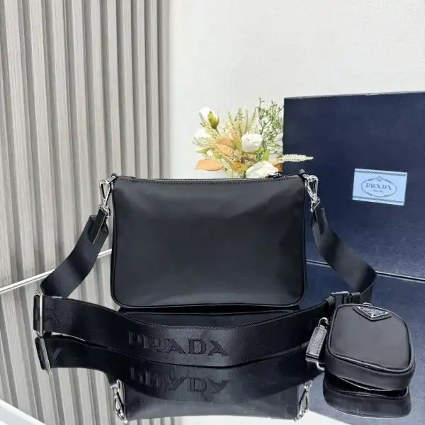 First bag ru Prada Re-Nylon and Saffiano leather shoulder bag