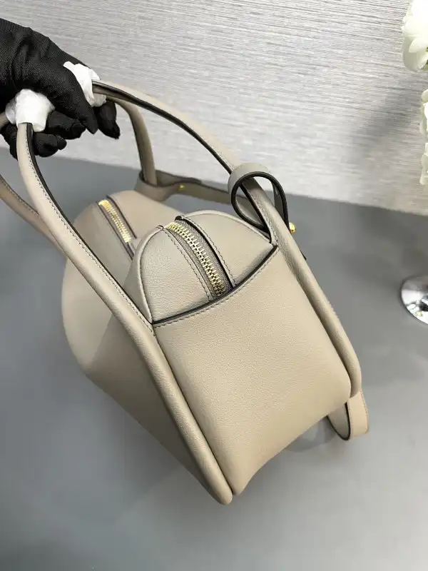 First bag ru Prada Darling leather handbag