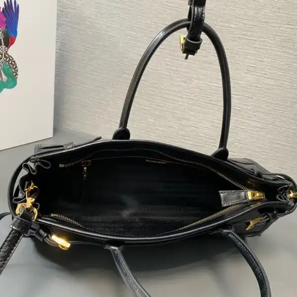 First bag ru Prada Medium leather handbag