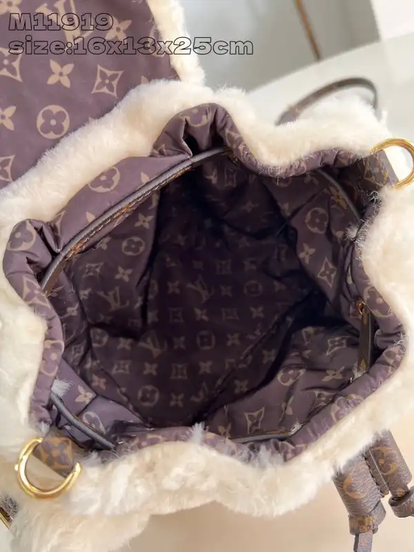 First bag ru Louis Vuitton Ski Nano Teddy Backpack