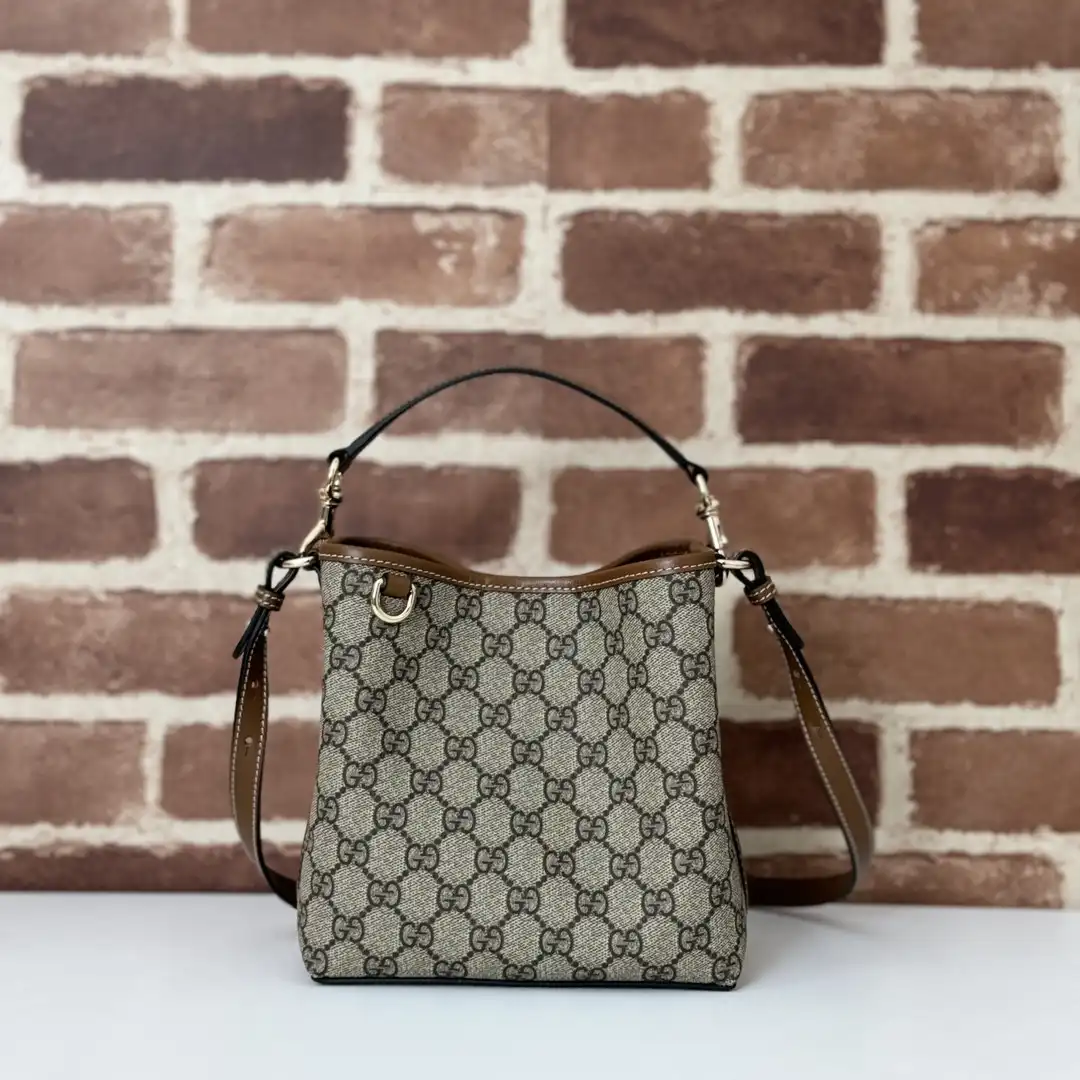 Gucci GG Emblem mini bucket bag