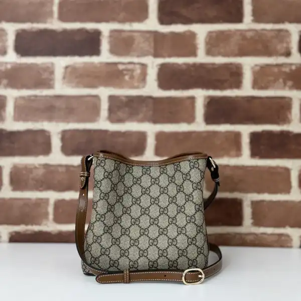 Gucci GG Emblem mini bucket bag