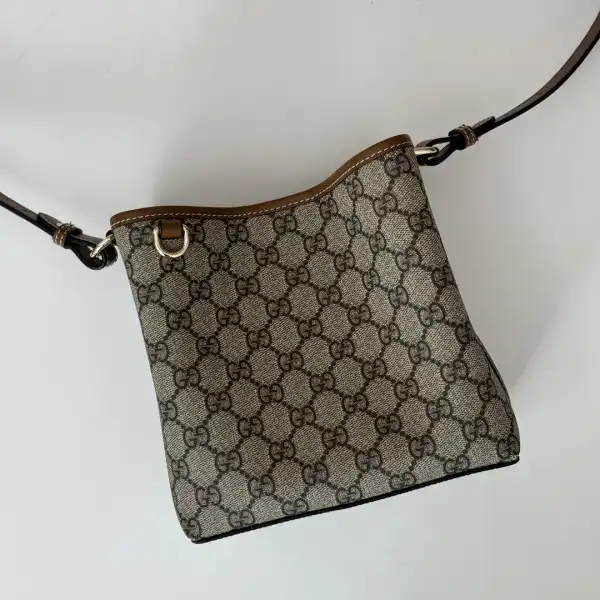 Gucci GG Emblem mini bucket bag