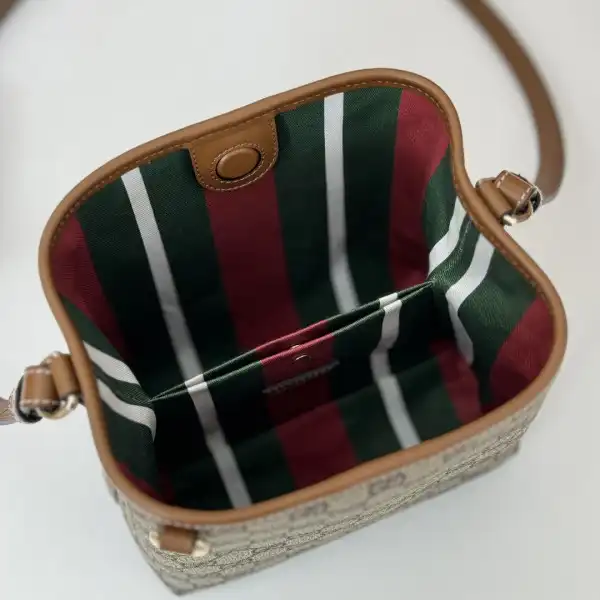 Gucci GG Emblem mini bucket bag