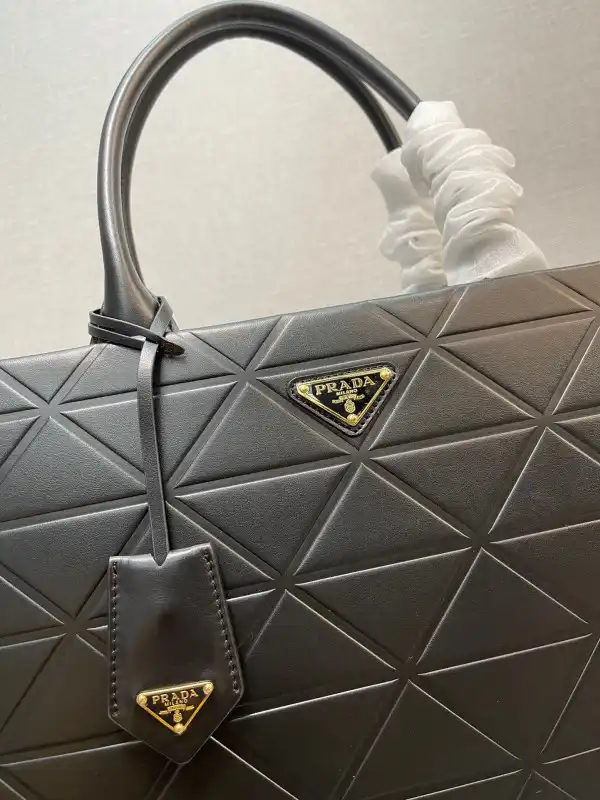 First bag ru Prada Symbole large leather bag $ 4,200