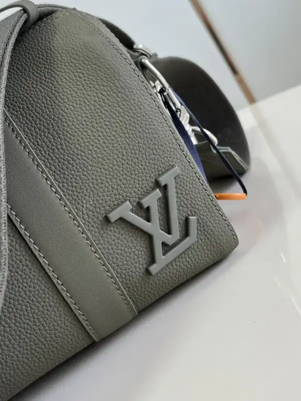 First bag ru LOUIS VUITTON CITY KEEPALL