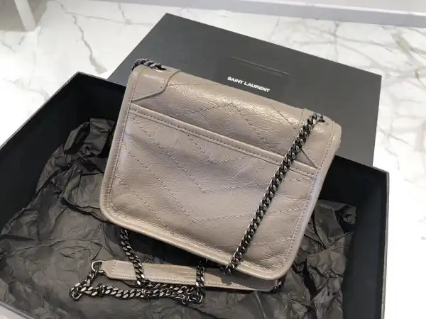 First bag ru YSL NIKI CHAIN WALLET