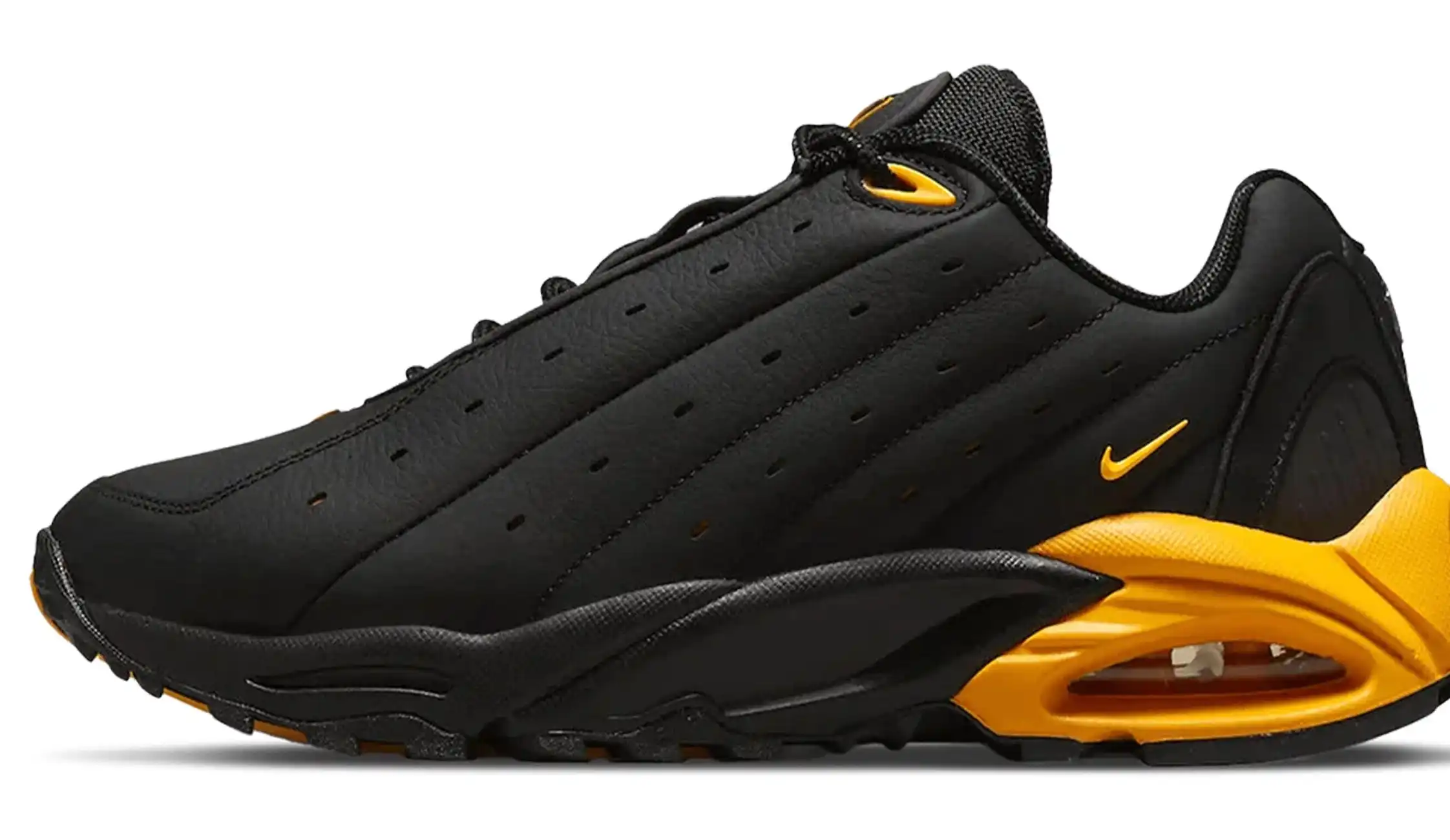 NOCTA x Nike Hot Step Air Terra 'Black University Gold'