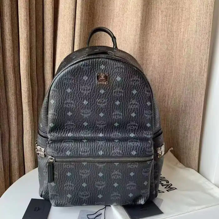 MCM backpack 13"W x 16"H x 5"D