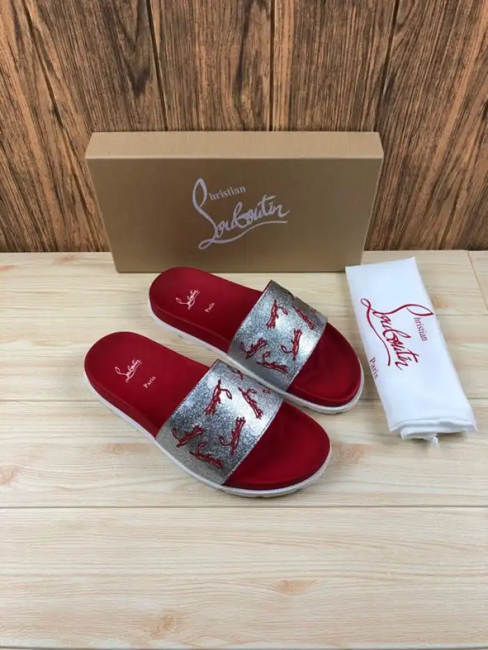 CHRISTIAN LOUBOUTIN SLIPPERS