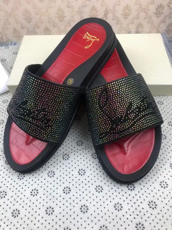 CHRISTIAN LOUBOUTIN SLIPPERS