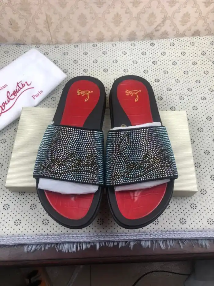 CHRISTIAN LOUBOUTIN SLIPPERS