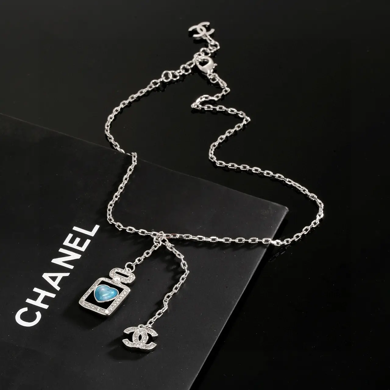 Chanel Blue Perfume Bottle Necklace