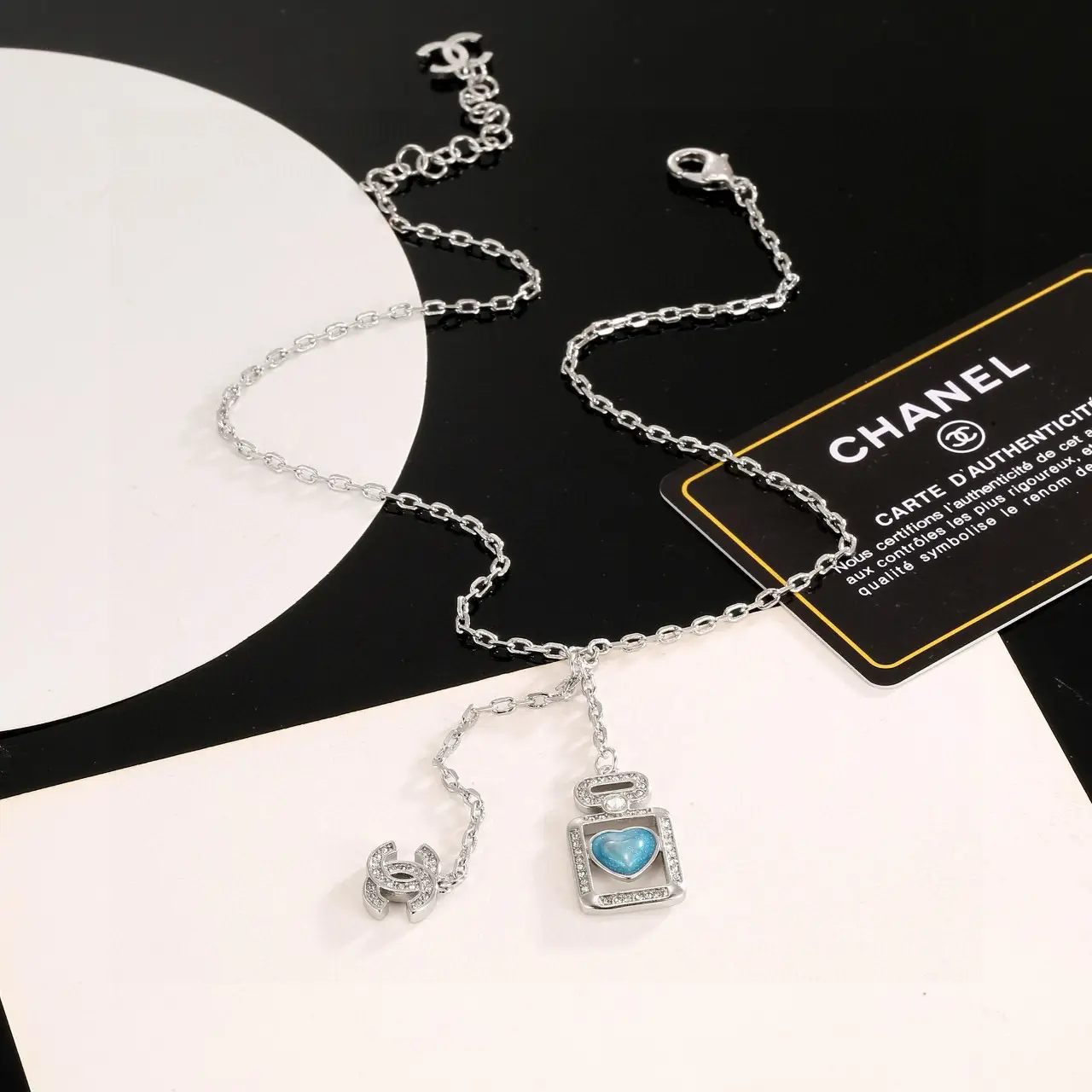 Chanel Blue Perfume Bottle Necklace