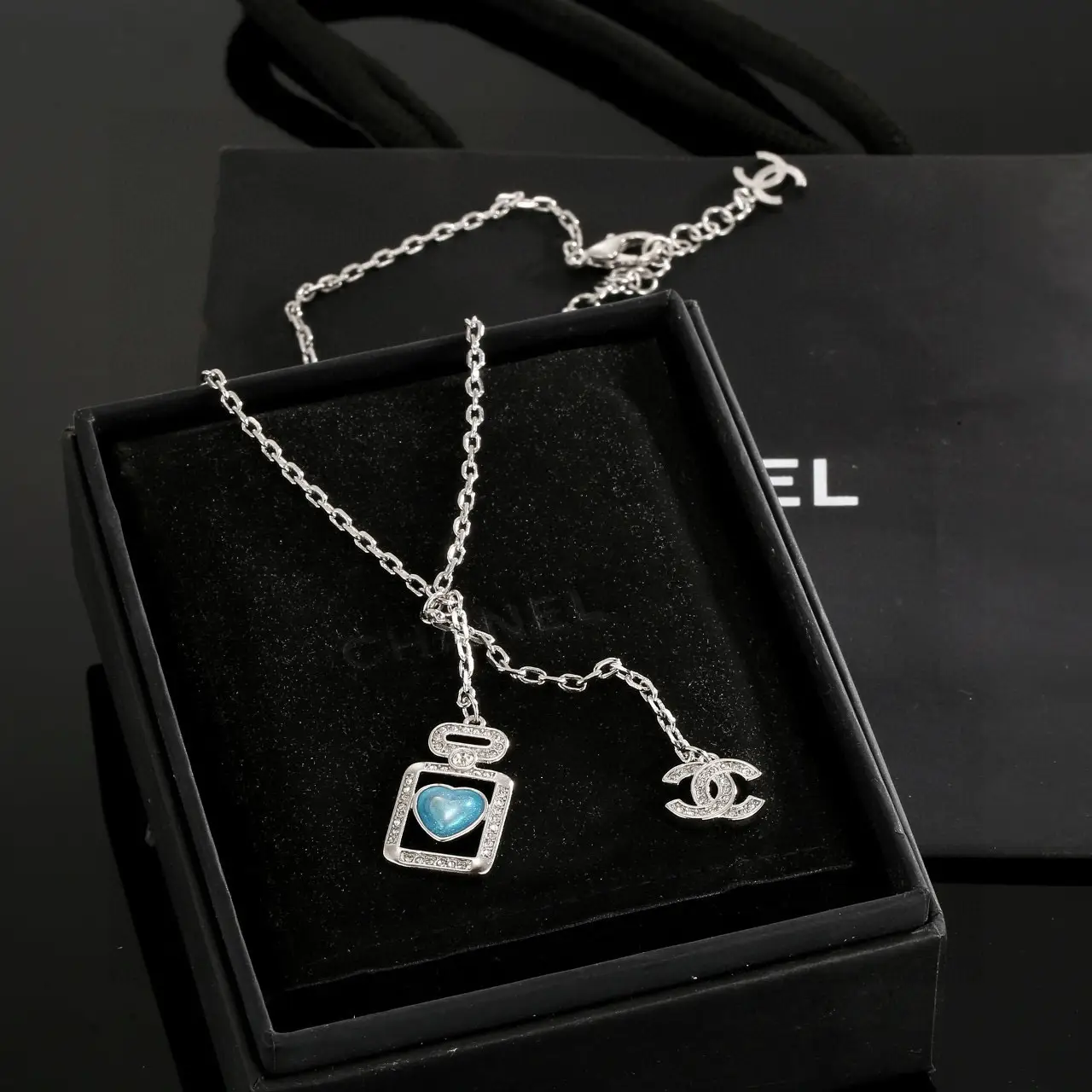 Chanel Blue Perfume Bottle Necklace