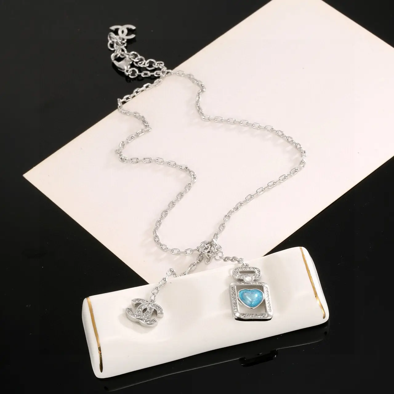 Chanel Blue Perfume Bottle Necklace