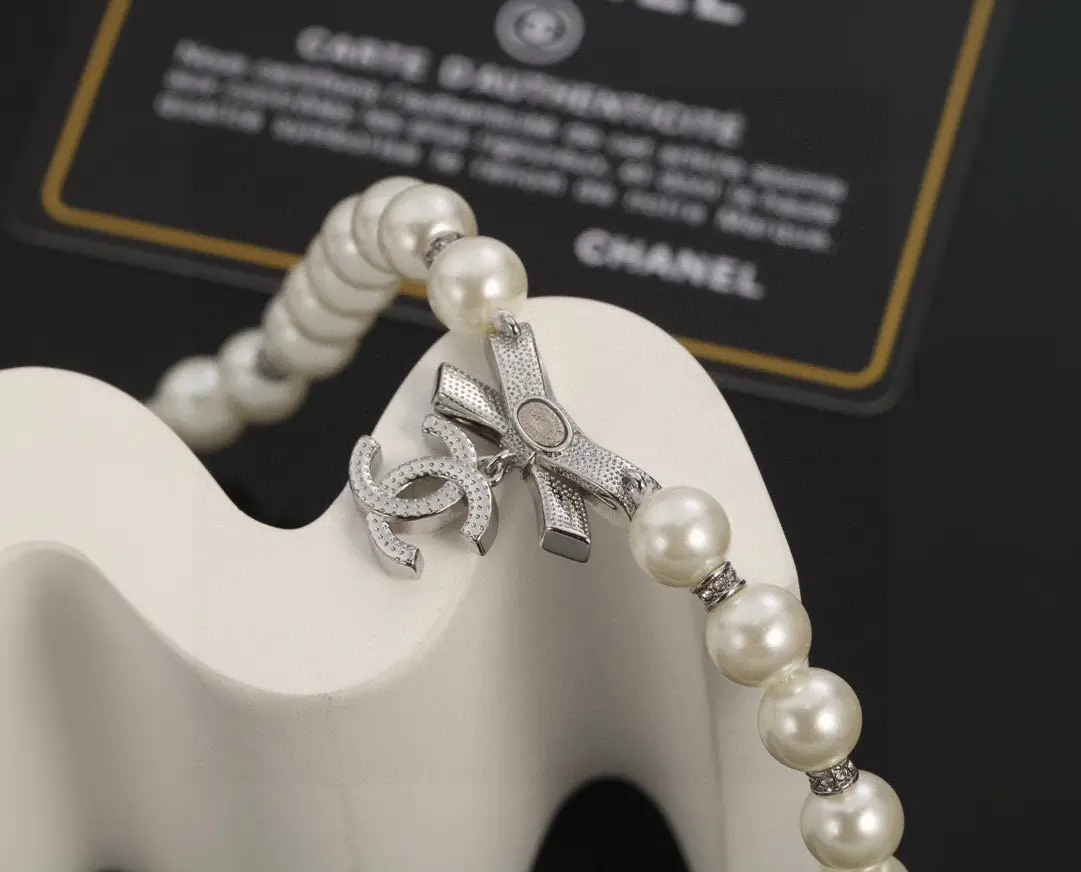 Chanel Pearl Bow Necklace