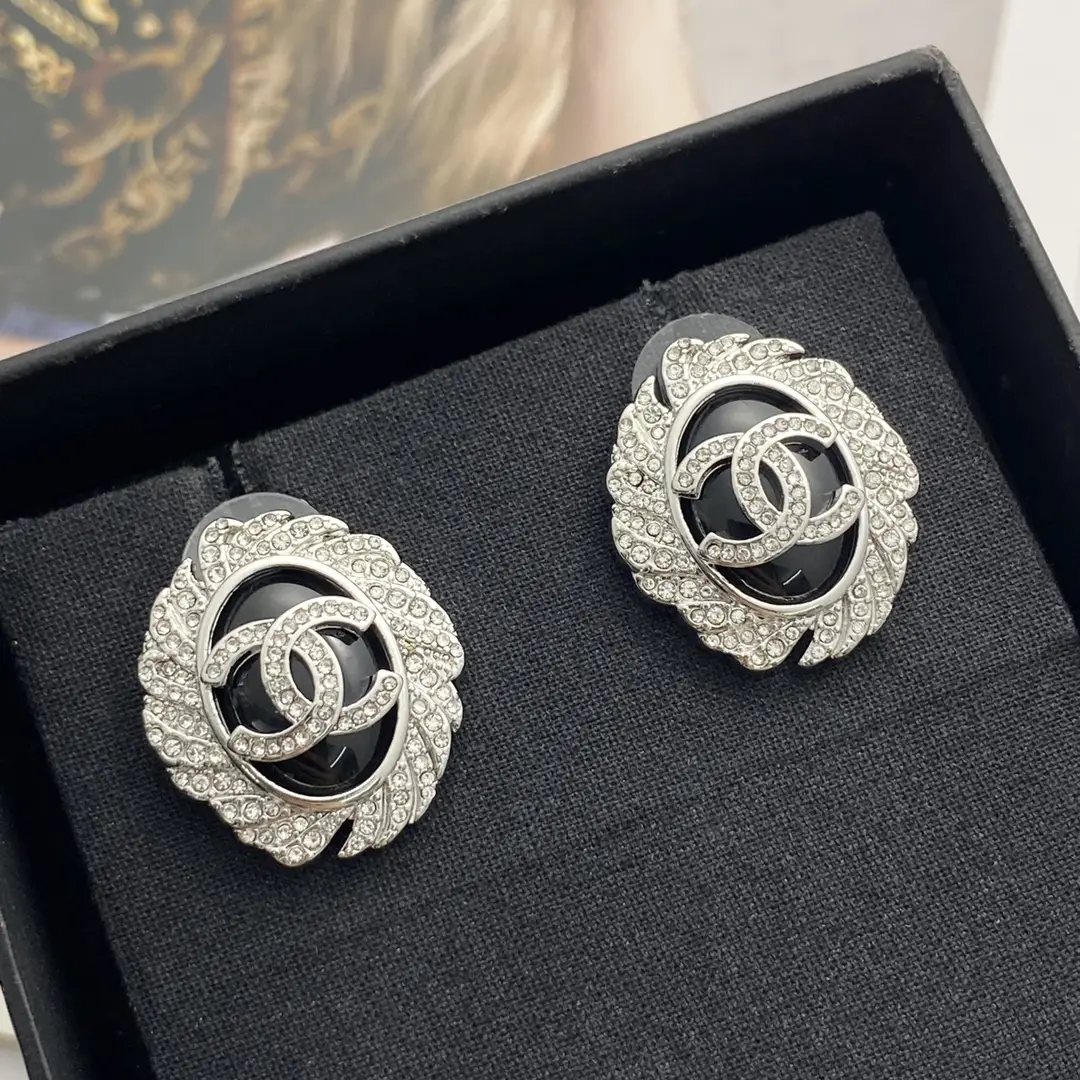Chanel diamond black oval gemstone stud earrings