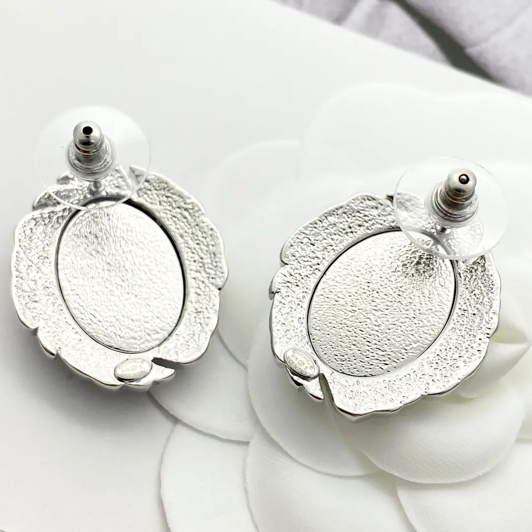 Chanel diamond black oval gemstone stud earrings