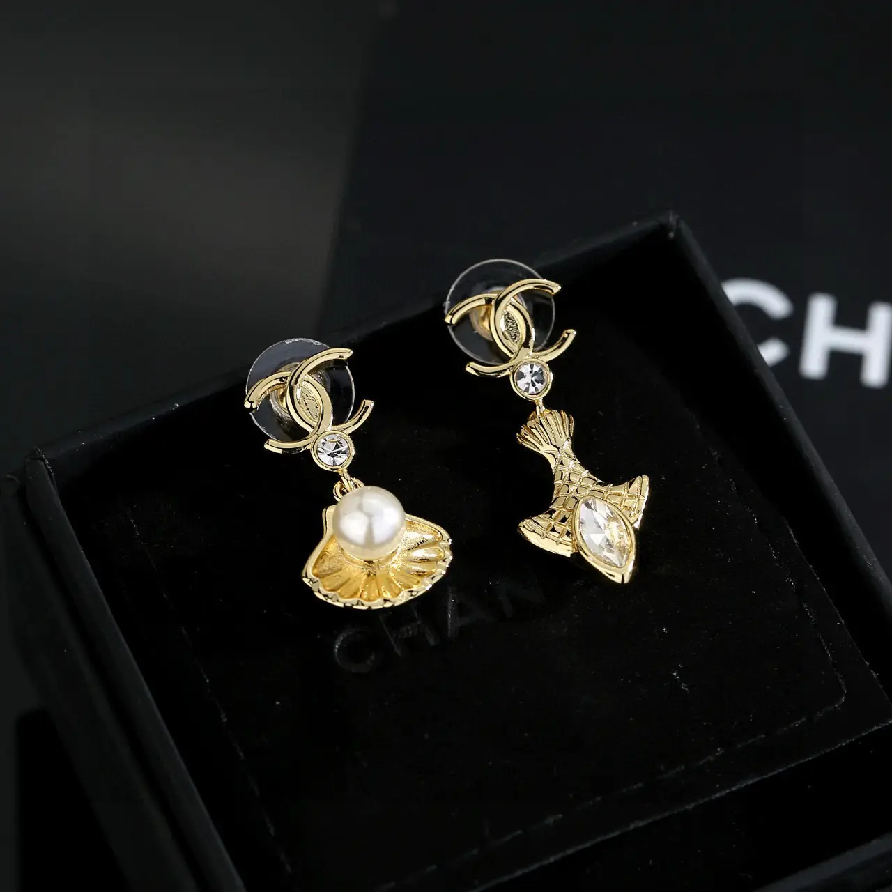 Chanel gold diamond scallop pearl earrings