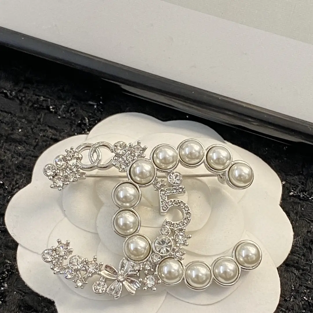 Chanel pearl and diamond brooch