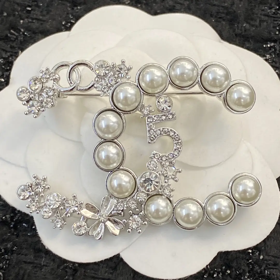 Chanel pearl and diamond brooch