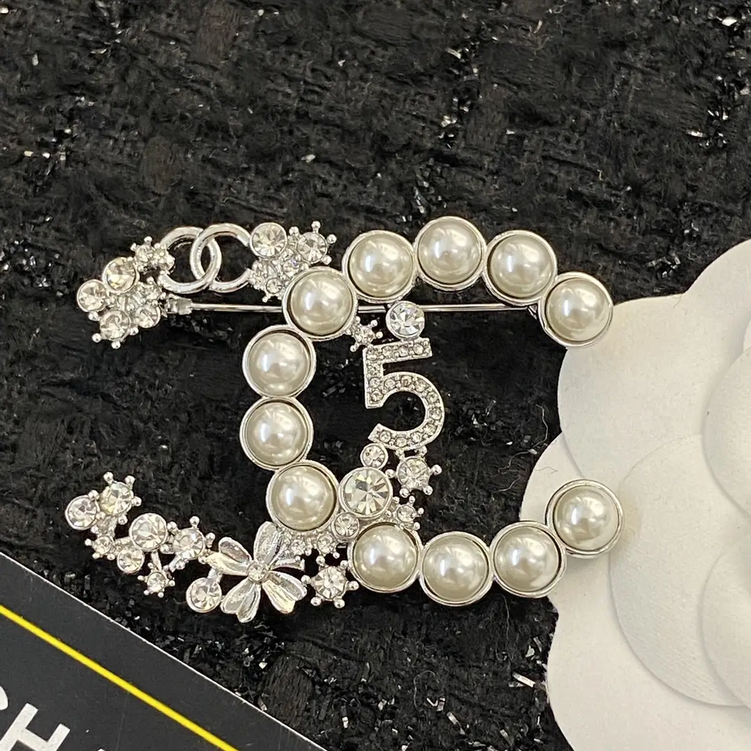 Chanel pearl and diamond brooch