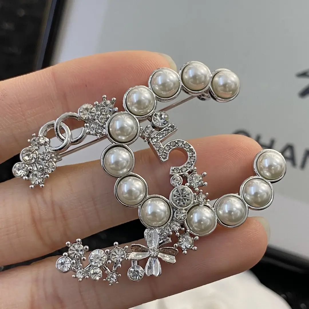 Chanel pearl and diamond brooch